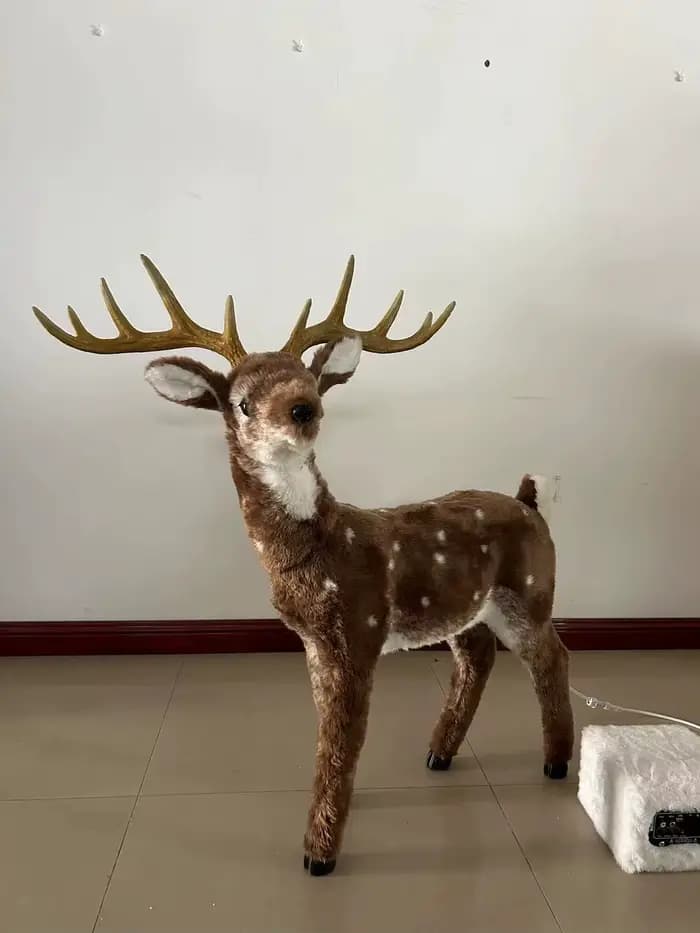 Renne animée, décorations de Noël d'intérieur, chant