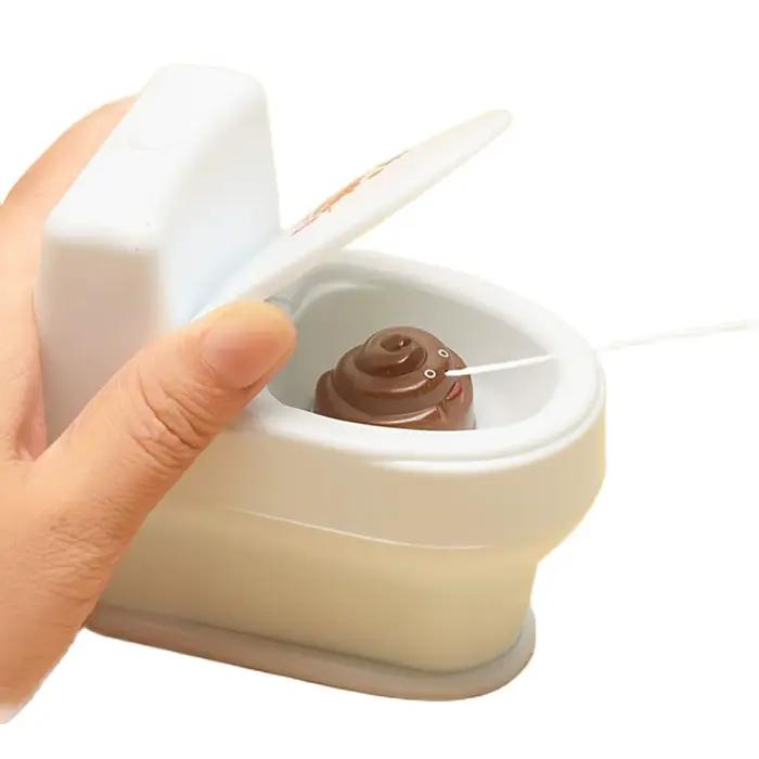 1PC-nouveau intéressant merde Spray farce jouet blague culinaire jouets Mini arroseur toilette pisto