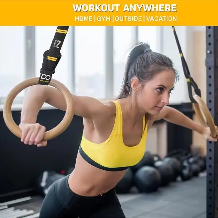 Anneaux de gymnastique en bois de 32 mm avec sangles numérotées à réglage rapide pour un contrôle amélioré de l'exercice