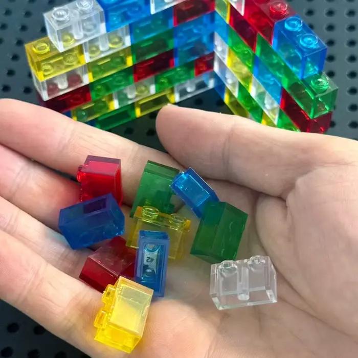 Briques à petites particules transparentes 1x2