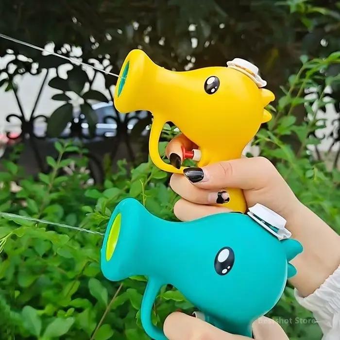 Pistolet à eau dessin animé en forme de pois pour enfants