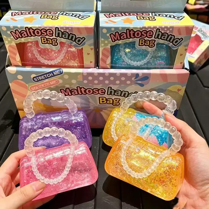 Lot de 12 jouets anti-stress TPR en forme de sac à main, rembourrés de maltose et pailletés, à remontée lente, pour la décompression et le soulagement de l'anxiété, cadeau fidget