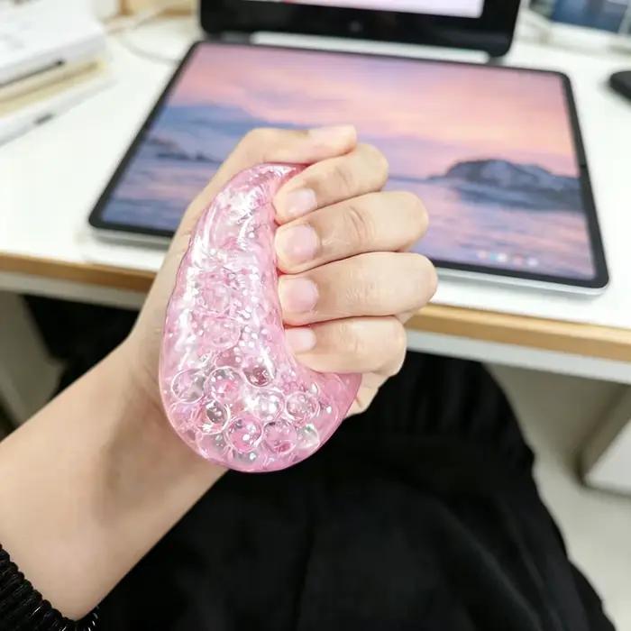 Jouet anti-stress en forme de bao bao vapeur avec perles et paillettes