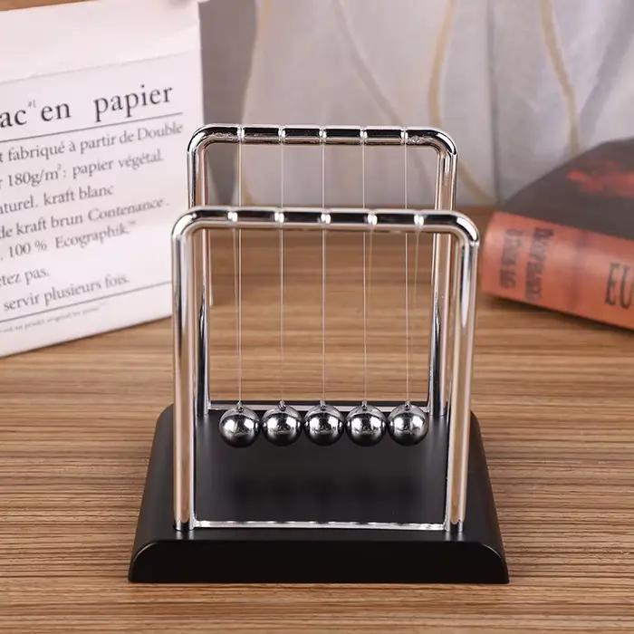 Boules d'équilibre au pendule Newton : décoration de bureau élégante et jouet dynamique éducatif pou