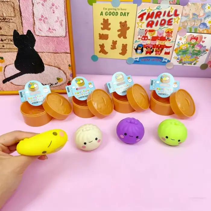 Boule anti-stress multicolore en forme de pain vapeur Smiley Bun