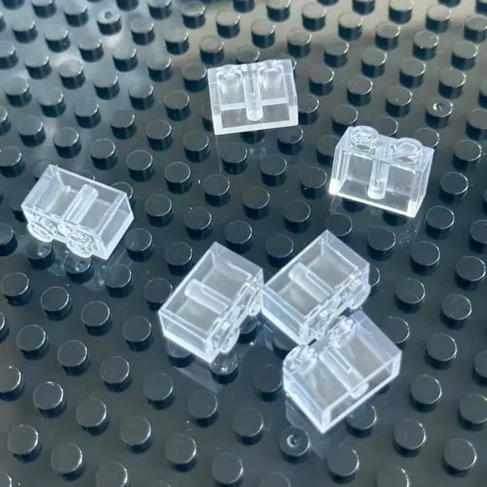 Briques à petites particules transparentes 1x2