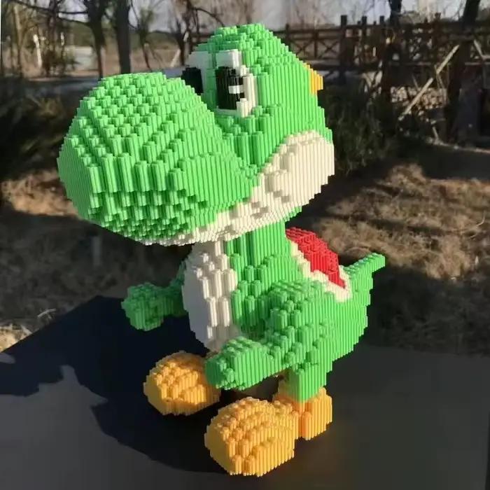 Nouveaux blocs de construction Disney Yaoxi dinosaure garçons petites particules Puzzle jouets pour enfants
