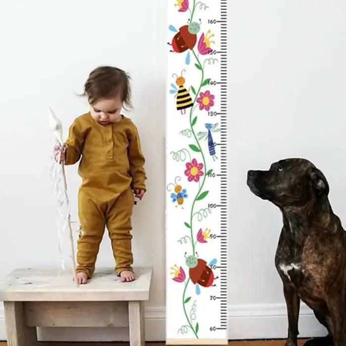 Règles de mesure de la taille des enfants à suspendre au mur avec cadre