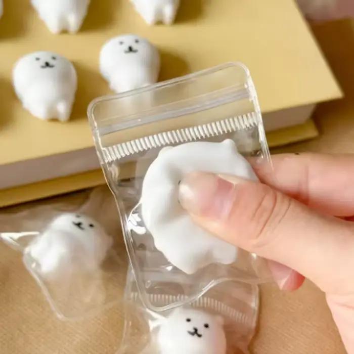 Jouet à pincer en forme d'ours blanc mignon
