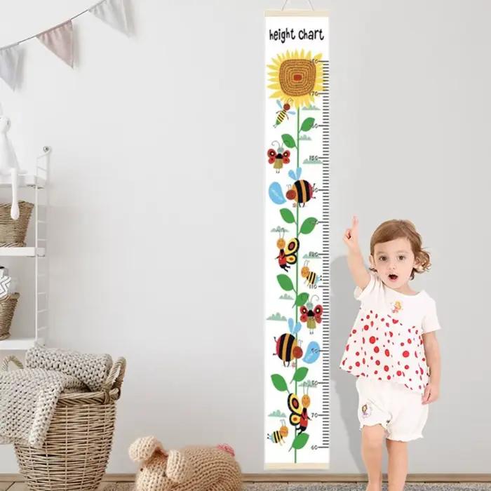 Règles de mesure de la taille des enfants à suspendre au mur avec cadre