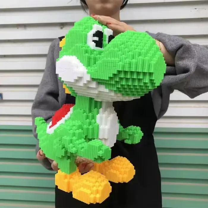 Nouveaux blocs de construction Disney Yaoxi dinosaure garçons petites particules Puzzle jouets pour enfants