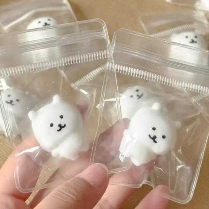 Jouet à pincer en forme d'ours blanc mignon