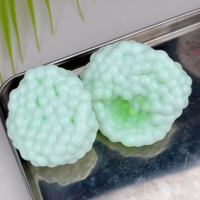 Jouet boule magique à texture sableuse